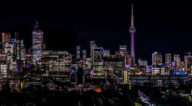 Sweeping night time view of Toronto’s skyline, as seen from Park Hyatt rooftop lounge