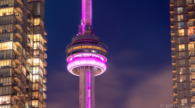 Toronto’s CN Tower framed by apartments